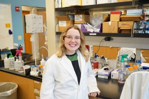 Lara Stefani poses for a photo in a research laboratory.