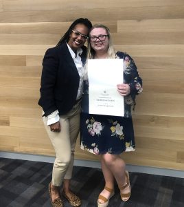 Rachel Sacharin and Maya Gibson posing for a picture together.