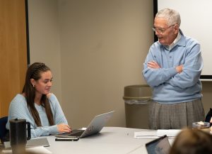 Gary Smith talking to a group of students.