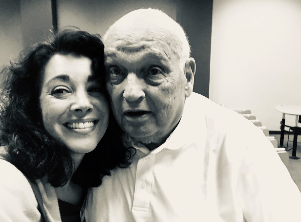 Rachel Harper and Bill Bondeson smiling while posing for a selfie.