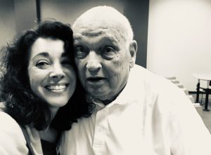 Rachel Harper and Bill Bondeson smiling while posing for a selfie.