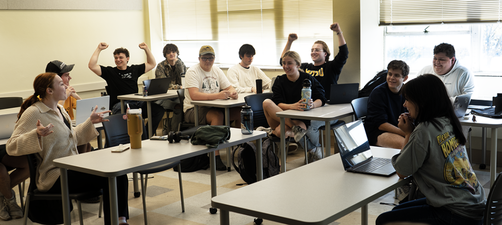 Students cheering in the classroom.