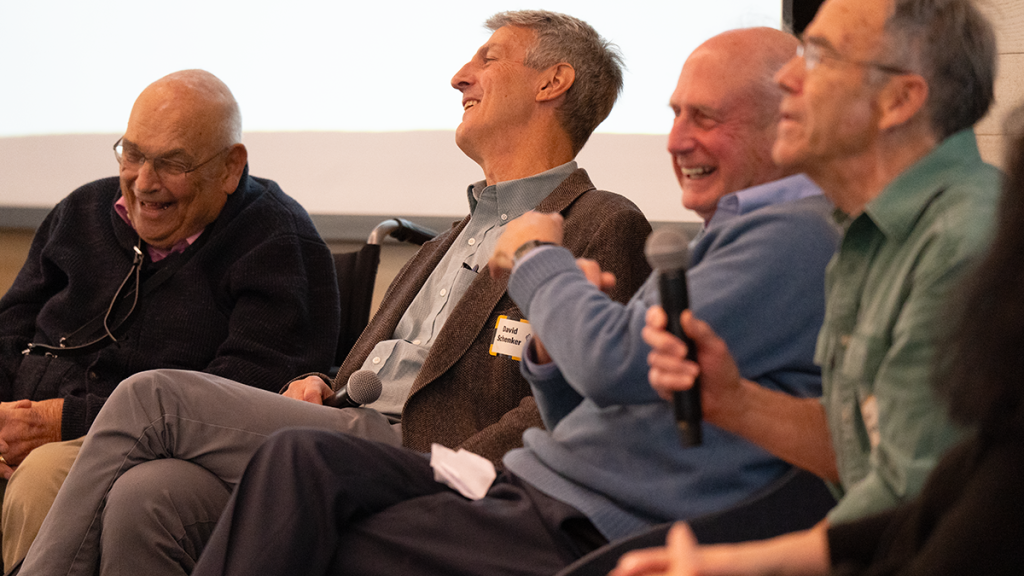 A group of individuals laughing.