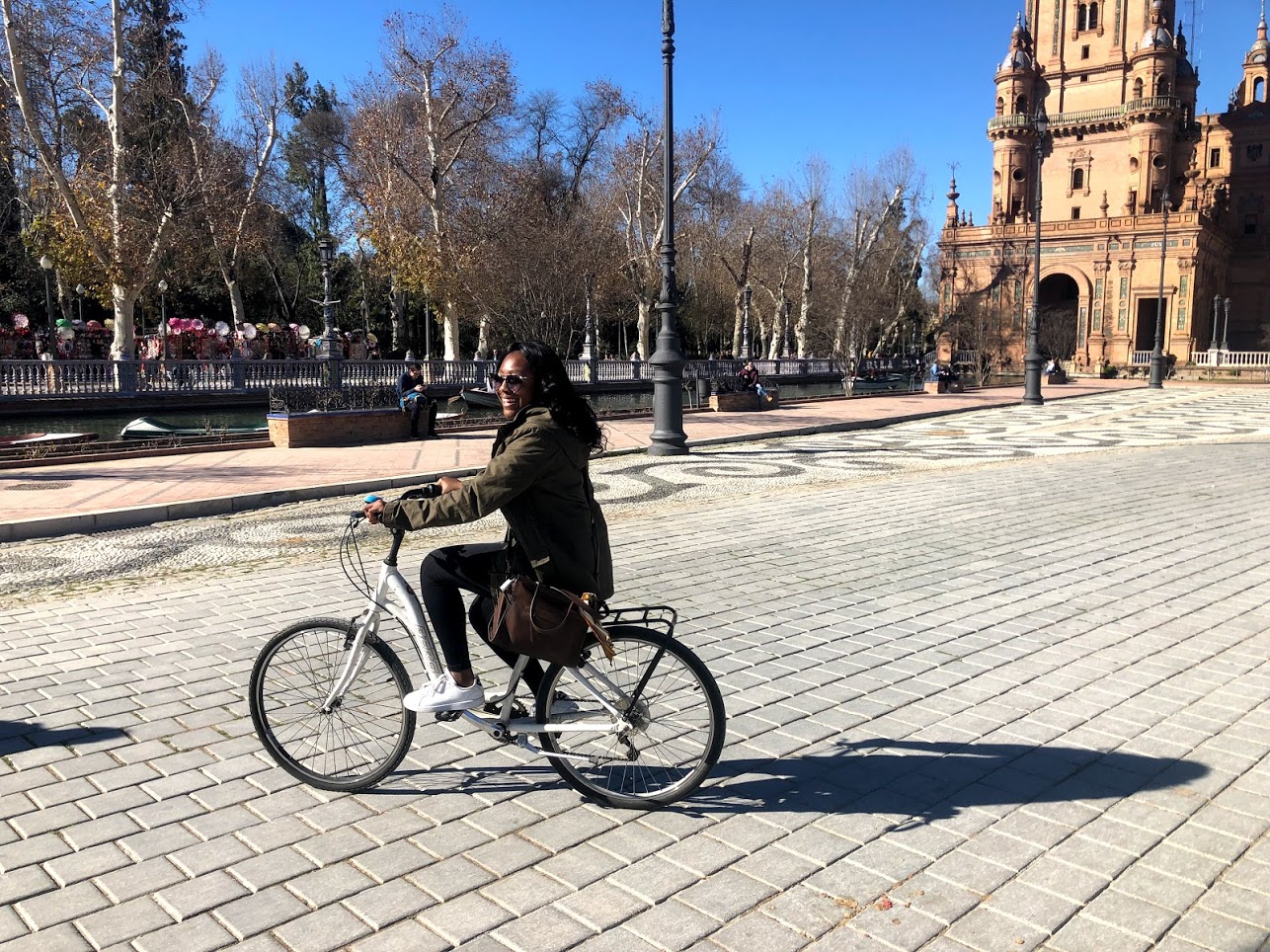 Student riding a bike in Seville