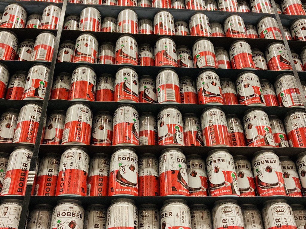 Cans of Logboat beer arranged in rows