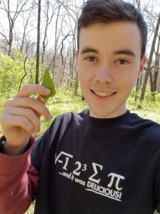 Quinn Cunningham shows off an arrowhead he found