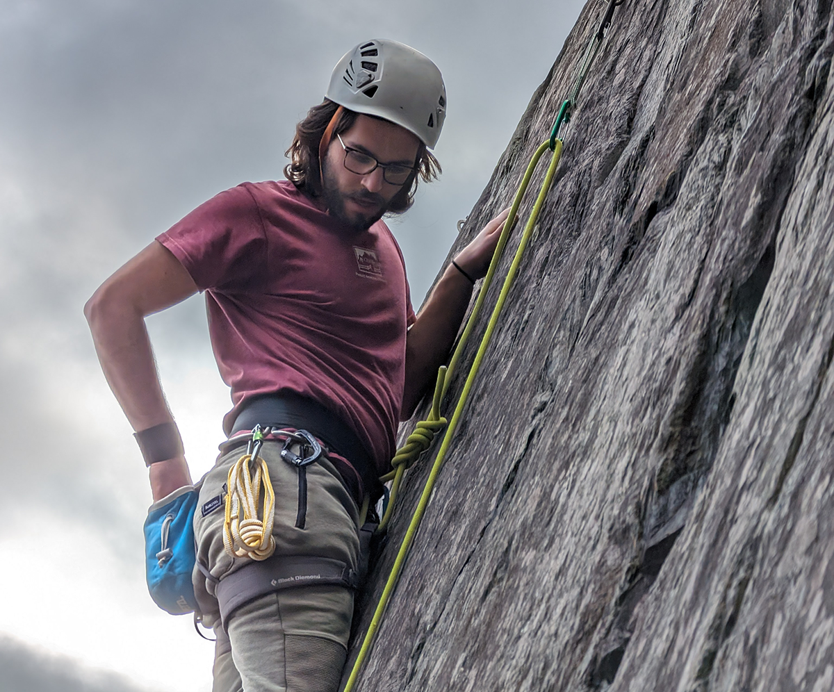 Sam Peterson climbing.