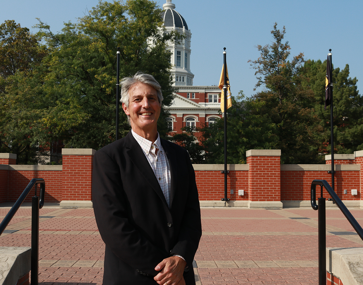 David Schenker stands in front of MU's Jesse Hall in Traditions Plaza