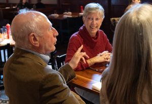 Susan Duncan smiling while talking to Ted Tarkow.